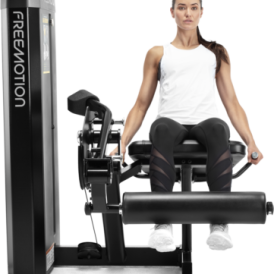 Woman using Leg Extension machine