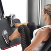 Woman using Leg Press machine