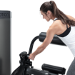 Woman using Back Extension machine