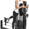 Woman using Glute machine