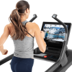 woman on incline trainer watching screen
