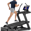 man running on incline trainer