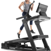 woman running on incline trainer