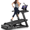 woman running on incline trainer