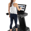 woman using treadmill screen