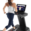 woman running on treadmill