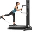 Woman using Total Glute/Hamstring machine
